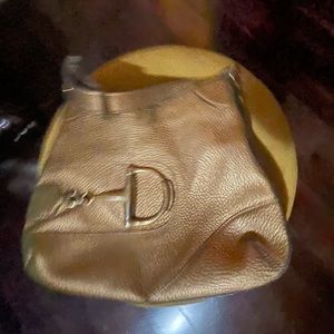 Gold Gucci handbag